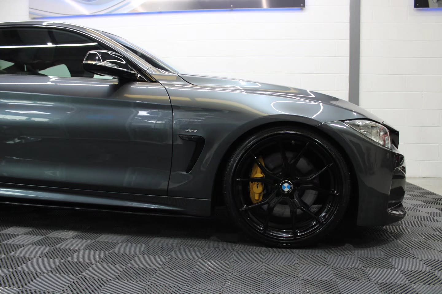 Detailed BMW wheel and arch after full detail